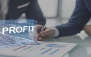 Team reviews growth charts—How to Calculate Business Service Profit made simple with expert tips from DK/RK Services for smarter financial planning.